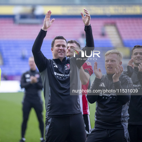 Exeter City F.C. manager Gary Caldwell celebrates at full time during the Sky Bet League 1 match between Bolton Wanderers and Exeter City at...