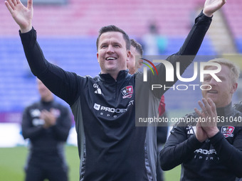 Exeter City F.C. manager Gary Caldwell celebrates at full time during the Sky Bet League 1 match between Bolton Wanderers and Exeter City at...