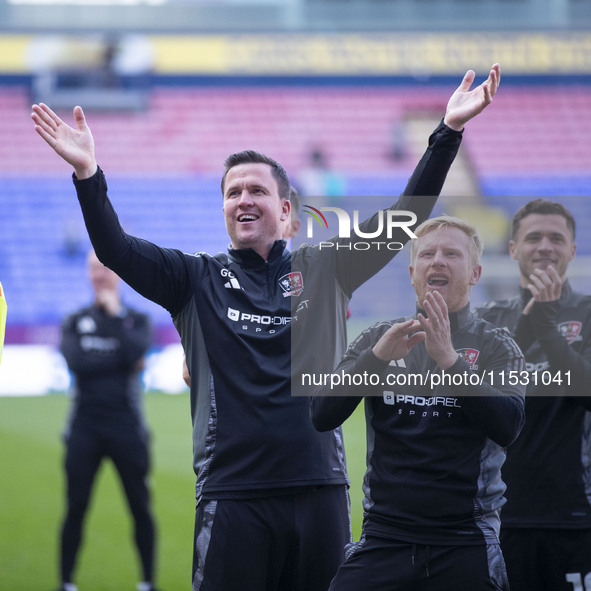 Exeter City F.C. manager Gary Caldwell celebrates at full time during the Sky Bet League 1 match between Bolton Wanderers and Exeter City at...