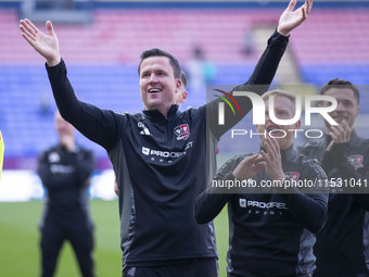 Exeter City F.C. manager Gary Caldwell celebrates at full time during the Sky Bet League 1 match between Bolton Wanderers and Exeter City at...