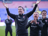 Exeter City F.C. manager Gary Caldwell celebrates at full time during the Sky Bet League 1 match between Bolton Wanderers and Exeter City at...