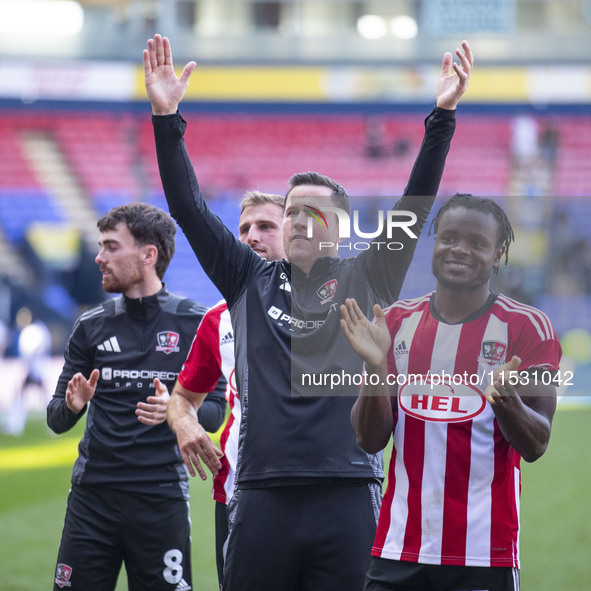 Exeter City F.C. manager Gary Caldwell celebrates at full time during the Sky Bet League 1 match between Bolton Wanderers and Exeter City at...