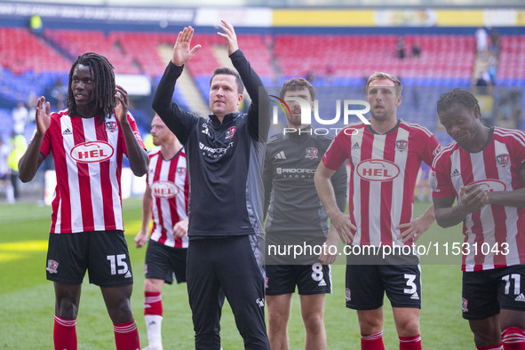 Exeter City F.C. manager Gary Caldwell celebrates at full time during the Sky Bet League 1 match between Bolton Wanderers and Exeter City at...