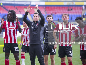 Exeter City F.C. manager Gary Caldwell celebrates at full time during the Sky Bet League 1 match between Bolton Wanderers and Exeter City at...