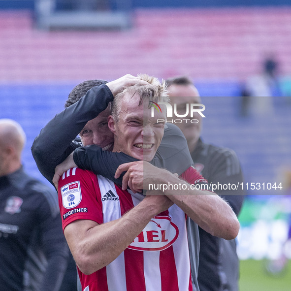 Exeter City F.C. manager Gary Caldwell celebrates at full time during the Sky Bet League 1 match between Bolton Wanderers and Exeter City at...