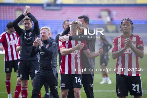 Exeter City F.C. manager Gary Caldwell celebrates at full time during the Sky Bet League 1 match between Bolton Wanderers and Exeter City at...