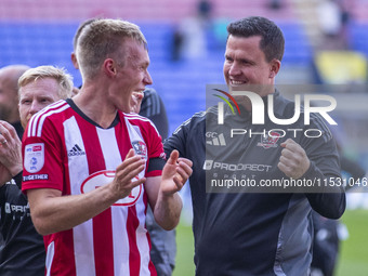 Exeter City F.C. manager Gary Caldwell celebrates at full time during the Sky Bet League 1 match between Bolton Wanderers and Exeter City at...