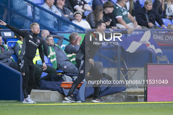 Exeter City F.C. manager Gary Caldwell gesticulates during the Sky Bet League 1 match between Bolton Wanderers and Exeter City at the Toughs...