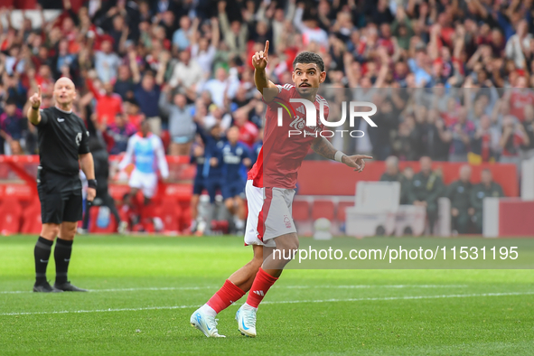 Morgan Gibbs-White of Nottingham Forest gestures towards the assistant referee after Forest's second goal is ruled offside during the Premie...