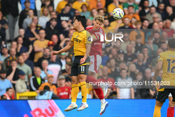 Ryan Yates of Nottingham Forest battles with Hwang Hee-Chan of Wolverhampton Wanderers during the Premier League match between Nottingham Fo...