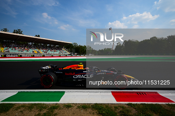 Sergio Perez of Red Bull Racing Honda drives his single-seater during qualifying of the Italian GP, the 16th round of the Formula 1 World Ch...