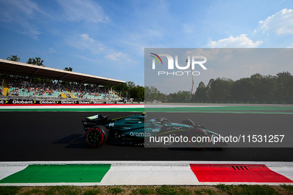 Fernando Alonso of Aston Martin Cognizant F1 Team drives his single-seater during qualifying of the Italian GP, the 16th round of the Formul...