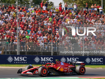 Carlos Sainz Jr. of Spain drives the (55) Scuderia Ferrari SF-24 Ferrari during the Formula 1 Pirelli Gran Premio d'Italia 2024 in Monza, It...