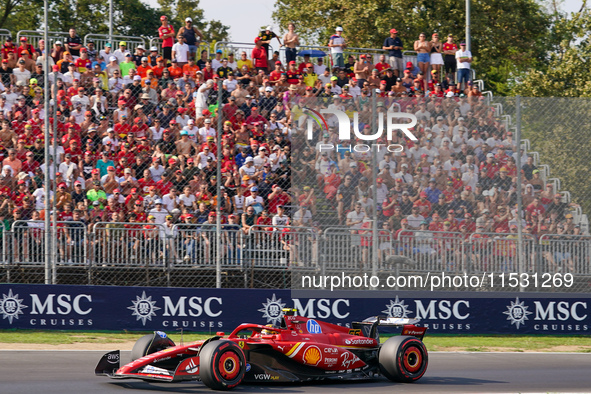 Carlos Sainz Jr. of Spain drives the (55) Scuderia Ferrari SF-24 Ferrari during the Formula 1 Pirelli Gran Premio d'Italia 2024 in Monza, It...