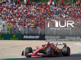 Carlos Sainz Jr. of Spain drives the (55) Scuderia Ferrari SF-24 Ferrari during the Formula 1 Pirelli Gran Premio d'Italia 2024 in Monza, It...