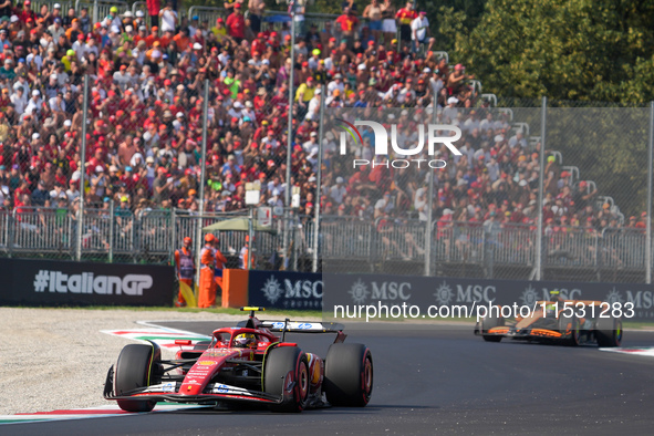 Carlos Sainz Jr. of Spain drives the (55) Scuderia Ferrari SF-24 Ferrari during the Formula 1 Pirelli Gran Premio d'Italia 2024 in Monza, It...