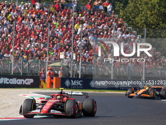 Carlos Sainz Jr. of Spain drives the (55) Scuderia Ferrari SF-24 Ferrari during the Formula 1 Pirelli Gran Premio d'Italia 2024 in Monza, It...