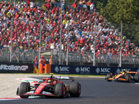 Carlos Sainz Jr. of Spain drives the (55) Scuderia Ferrari SF-24 Ferrari during the Formula 1 Pirelli Gran Premio d'Italia 2024 in Monza, It...