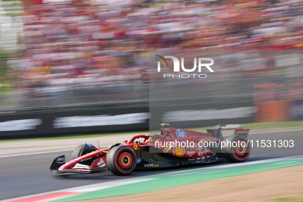 Carlos Sainz Jr. of Spain drives the (55) Scuderia Ferrari SF-24 Ferrari during the Formula 1 Pirelli Gran Premio d'Italia 2024 in Monza, It...