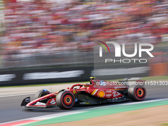 Carlos Sainz Jr. of Spain drives the (55) Scuderia Ferrari SF-24 Ferrari during the Formula 1 Pirelli Gran Premio d'Italia 2024 in Monza, It...