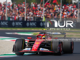 Carlos Sainz Jr. of Spain drives the (55) Scuderia Ferrari SF-24 Ferrari during the Formula 1 Pirelli Gran Premio d'Italia 2024 in Monza, It...