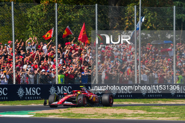 Carlos Sainz Jr. of Spain drives the (55) Scuderia Ferrari SF-24 Ferrari during the Formula 1 Pirelli Gran Premio d'Italia 2024 in Monza, It...