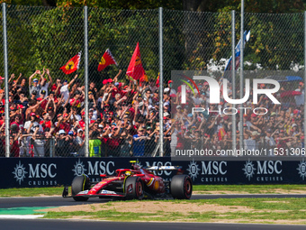 Carlos Sainz Jr. of Spain drives the (55) Scuderia Ferrari SF-24 Ferrari during the Formula 1 Pirelli Gran Premio d'Italia 2024 in Monza, It...