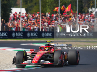 Carlos Sainz Jr. of Spain drives the (55) Scuderia Ferrari SF-24 Ferrari during the Formula 1 Pirelli Gran Premio d'Italia 2024 in Monza, It...