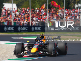 Sergio Perez of Mexico drives the (11) Oracle Red Bull Racing RB20 Honda RBPT during the Formula 1 Pirelli Gran Premio d'Italia 2024 in Monz...