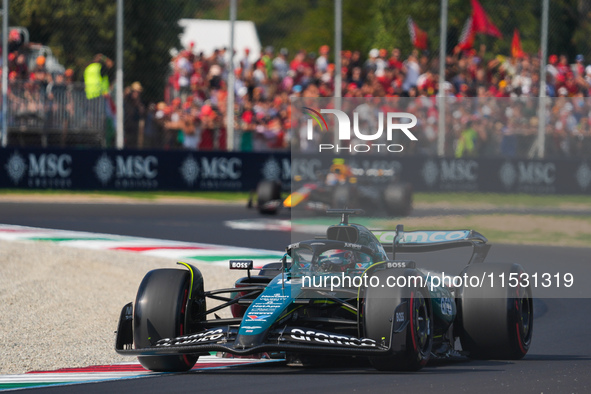 Lance Stroll of Canada drives the (18) Aston Martin Aramco Cognizant F1 Team AMR24 Mercedes during the Formula 1 Pirelli Gran Premio d'Itali...