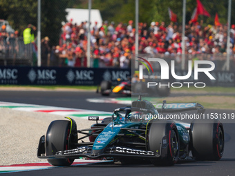 Lance Stroll of Canada drives the (18) Aston Martin Aramco Cognizant F1 Team AMR24 Mercedes during the Formula 1 Pirelli Gran Premio d'Itali...