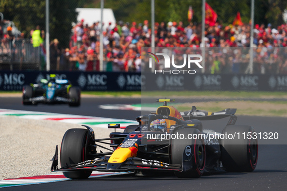 Sergio Perez of Mexico drives the (11) Oracle Red Bull Racing RB20 Honda RBPT during the Formula 1 Pirelli Gran Premio d'Italia 2024 in Monz...