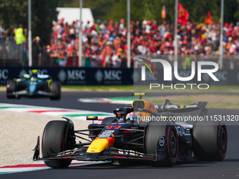 Sergio Perez of Mexico drives the (11) Oracle Red Bull Racing RB20 Honda RBPT during the Formula 1 Pirelli Gran Premio d'Italia 2024 in Monz...