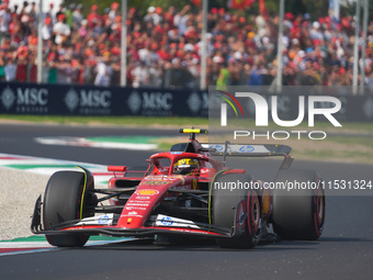 Carlos Sainz Jr. of Spain drives the (55) Scuderia Ferrari SF-24 Ferrari during the Formula 1 Pirelli Gran Premio d'Italia 2024 in Monza, It...