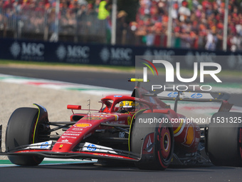 Carlos Sainz Jr. of Spain drives the (55) Scuderia Ferrari SF-24 Ferrari during the Formula 1 Pirelli Gran Premio d'Italia 2024 in Monza, It...