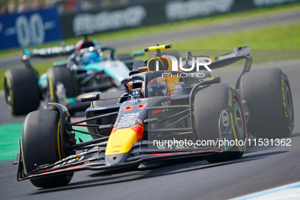 Sergio Perez of Mexico drives the (11) Oracle Red Bull Racing RB20 during FP3 of the Formula 1 Pirelli Gran Premio d'Italia 2024 in Monza, I...