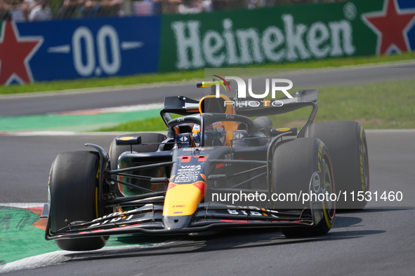 Sergio Perez of Mexico drives the (11) Oracle Red Bull Racing RB20 Honda RBPT during the Formula 1 Pirelli Gran Premio d'Italia 2024 in Monz...