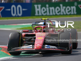 Carlos Sainz Jr. of Spain drives the (55) Scuderia Ferrari SF-24 Ferrari during the Formula 1 Pirelli Gran Premio d'Italia 2024 in Monza, It...