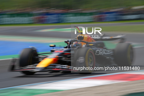 Sergio Perez of Mexico drives the (11) Oracle Red Bull Racing RB20 Honda RBPT during the Formula 1 Pirelli Gran Premio d'Italia 2024 in Monz...