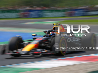 Sergio Perez of Mexico drives the (11) Oracle Red Bull Racing RB20 Honda RBPT during the Formula 1 Pirelli Gran Premio d'Italia 2024 in Monz...