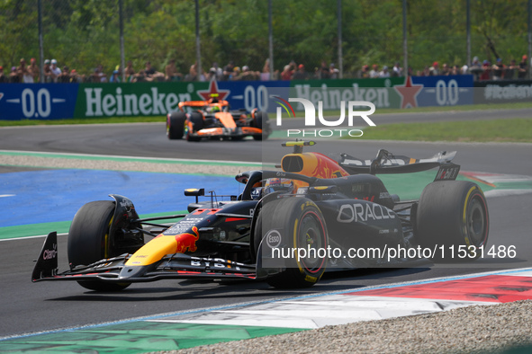 Sergio Perez of Mexico drives the (11) Oracle Red Bull Racing RB20 Honda RBPT during the Formula 1 Pirelli Gran Premio d'Italia 2024 in Monz...