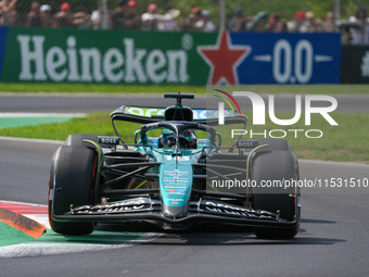 Lance Stroll of Canada drives the (18) Aston Martin Aramco Cognizant F1 Team AMR24 Mercedes during the Formula 1 Pirelli Gran Premio d'Itali...