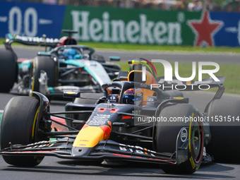 Sergio Perez of Mexico drives the (11) Oracle Red Bull Racing RB20 Honda RBPT during the Formula 1 Pirelli Gran Premio d'Italia 2024 in Monz...