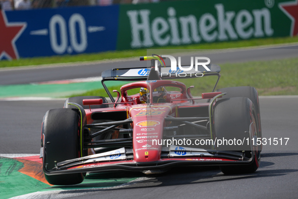 Carlos Sainz Jr. of Spain drives the (55) Scuderia Ferrari SF-24 Ferrari during the Formula 1 Pirelli Gran Premio d'Italia 2024 in Monza, It...