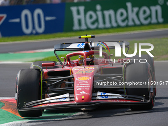 Carlos Sainz Jr. of Spain drives the (55) Scuderia Ferrari SF-24 Ferrari during the Formula 1 Pirelli Gran Premio d'Italia 2024 in Monza, It...