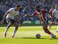 Millenic Alli #11 of Exeter City F.C. is in possession of the ball during the Sky Bet League 1 match between Bolton Wanderers and Exeter Cit...