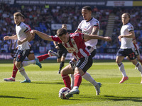 Jack Aitchison #10 of Exeter City F.C. crosses during the Sky Bet League 1 match between Bolton Wanderers and Exeter City at the Toughsheet...