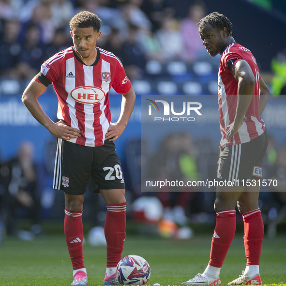 Kamari Doyle #20 of Exeter City F.C. prepares to take the free-kick during the Sky Bet League 1 match between Bolton Wanderers and Exeter Ci...