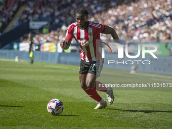 Millenic Alli #11 of Exeter City F.C. during the Sky Bet League 1 match between Bolton Wanderers and Exeter City at the Toughsheet Stadium i...