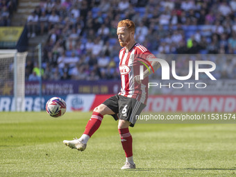 Ryan Woods #6 of Exeter City F.C. during the Sky Bet League 1 match between Bolton Wanderers and Exeter City at the Toughsheet Stadium in Bo...